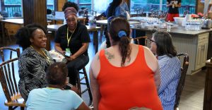 group of folks talking about water fasting